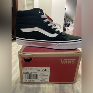 Women’s high top Vans sneakers